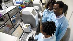 African Centre of Excellence for Genomics of Infectious Diseases (ACEGID) molecular biologists analyse COVID-19 samples in the laboratory located at the Redeemerx92s University in Ede, southwestern Nigeria, on June 2, 2020. - The African Centre of Excelle