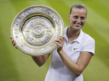 Petra Kvitova lifting the Wimbledon trophy in 2014