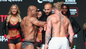Nov 14, 2024; Irving, TX, USA; Mike Tyson slaps Jake Paul after weighing in at the Toyota Music Factory. Mandatory Credit: Kevin Jairaj-Imagn Images