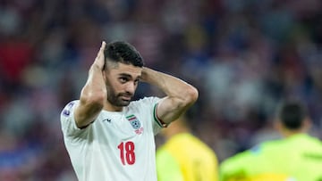 DOHA, QATAR - NOVEMBER 29: Ali Karimi of Iran looks on dejected after the FIFA World Cup Qatar 2022 Group B match between IR Iran and USA at Al Thumama Stadium on November 29, 2022 in Doha, Qatar. (Photo by Mohammad Karamali/DeFodi Images via Getty Images)