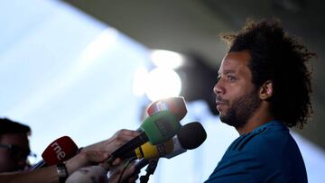 Real Madrid's Brazilian defender Marcelo addresses journalists after a training session during Real Madrid's Media Open Day ahead of their UEFA Champions league final footbal match against Liverpool FC, in Madrid on May 22, 2018. / AFP PHOTO / G