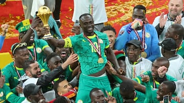 FILE - Senegal's Sadio Mane holds the trophy aloft as he celebrates with teammates after winning the Africa Cup of Nations final soccer match between Senegal and Morocco in Rabat, Morocco, Sunday, Jan. 18, 2026. (AP Photo/Youssef Loulidi, File)
Associate Press/ LaPresse
Only Italy and Spain