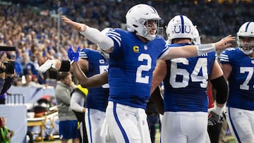 Nov 28, 2021; Indianapolis, Indiana, USA; Indianapolis Colts quarterback Carson Wentz (2) celebrates his touchdown pass by doing the TY Hilton celebration in the first half against the Tampa Bay Buccaneers at Lucas Oil Stadium. Mandatory Credit: Trevor Ru