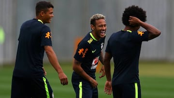 Soccer Football - 2018 World Cup Qualifications - South America - Brazil Training - Teresopolis, Brazil - October 3, 2017 - Brazil&#039;s soccer players Neymar jokes with teammates during a training session ahead of their match against Bolivia. REUTERS/Pilar Olivares