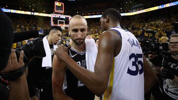 OAKLAND, CA - APRIL 24: Manu Ginobili #20 of the San Antonio Spurs shakes hands with Kevin Durant #35 of the Golden State Warriors after the Warriors beat the Spurs in Game Five of Round One of the 2018 NBA Playoffs at ORACLE Arena on April 24, 2018 in Oa