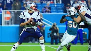 MIAMI GARDENS, FL - DECEMBER 11: Tom Brady #12 of the New England Patriots looks to pass during the third quarter against the Miami Dolphins at Hard Rock Stadium on December 11, 2017 in Miami Gardens, Florida.   Chris Trotman/Getty Images/AFP
 == FOR NEWSPAPERS, INTERNET, TELCOS &amp; TELEVISION USE ONLY ==