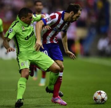 Carlos Tevez y Juanfran 