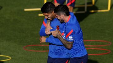 De Paul con Luis Suárez en una sesión del Atlético. Es su momento.