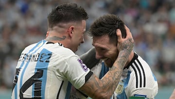 Argentina's midfielder #24 Enzo Fernandez (L) celebrates scoring his team's second goal with Argentina's forward #10 Lionel Messi during the Qatar 2022 World Cup Group C football match between Argentina and Mexico at the Lusail Stadium in Lusail, north of Doha on November 26, 2022. (Photo by JUAN MABROMATA / AFP)