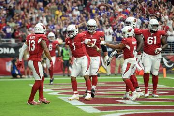 Sep 19, 2021; Glendale, Arizona, USA; Arizona Cardinals quarterback Kyler Murray (1) celebrates a touchdown against the Minnesota Vikings during the first half at State Farm Stadium. Mandatory Credit: Joe Camporeale-USA TODAY Sports