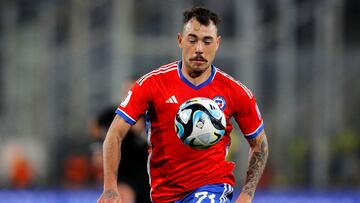 Chile's defender Matias Catalan eyes the ball during the 2026 FIFA World Cup South American qualifiers football match between Chile and Colombia, at the David Arellano Monumental stadium, in Santiago, on September 12, 2023. (Photo by Javier TORRES / AFP)