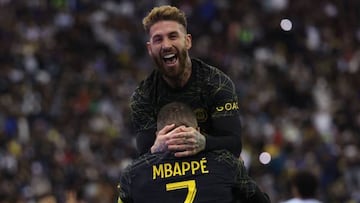 Paris Saint-Germain's Spanish defender Sergio Ramos celebrates scoring his team's third goal with Paris Saint-Germain's French forward Kylian Mbappe during the Riyadh Season Cup football match between the Riyadh All-Stars and Paris Saint-Germain at the King Fahd Stadium in Riyadh on January 19, 2023. (Photo by Giuseppe CACACE / AFP) (Photo by GIUSEPPE CACACE/AFP via Getty Images)