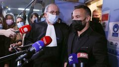 France&#039;s football player Mathieu Valbuena (R), involved in a &#039;sex tape case&#039;, addresses media representatives next to lawyer Paul Albert Iweins (C) inside a court at the end of the hearing in Versailles, west of Paris on October 20, 2021, o