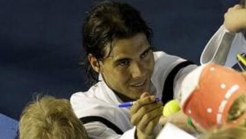 <b>DEBERES DE NÚMERO UNO. </b>Rafa Nadal con cara ilusionada: el número uno cumple con sus deberes.