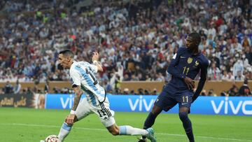 LUSAIL CITY, QATAR - DECEMBER 18: Angel Di Maria of Argentina is fouled by Ousmane Dembele of France which leads to a penalty to Argentina during the FIFA World Cup Qatar 2022 Final match between Argentina and France at Lusail Stadium on December 18, 2022 in Lusail City, Qatar. (Photo by Maja Hitij - FIFA/FIFA via Getty Images)