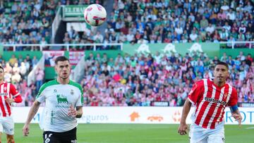 18-09-24. COTE CORRE JUNTO A MICHELIN DURANTE EL PARTIDO RACING-SPORTING.