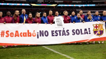 The women's teams of Barcelona and América show a message of support for Spanish soccer player Jennifer Hermoso, at the Azteca Stadium in Mexico City.