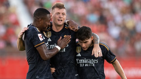 Real Madrid's German midfielder #08 Toni Kroos (C) celebrates a goal that after the VAR review was disallowed, with Real Madrid's Austrian defender #04 David Alaba and Real Madrid's Spanish defender #20 Fran Garcia during the Spanish Liga football match between UD Almeria and Real Madrid CF at the Municipal Stadium of the Mediterranean Games in Almeria on August 19, 2023. (Photo by JORGE GUERRERO / AFP)