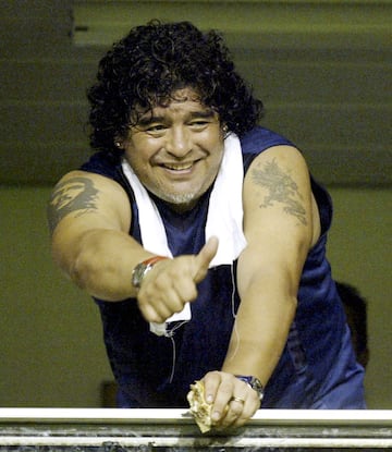 Diego Armando Maradona supporting Boca Juniors at La Bombonera.