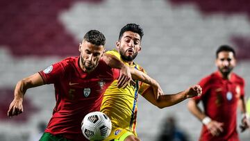 Portugal&#039;s defender Domingos Duarte (L) vies with Andorra&#039;s midfielder Jordi Alaez during the international friendly football match between Portugal and Andorra at the Luz stadium in Lisbon on November 11, 2020. (Photo by PATRICIA DE MELO MOREIRA / AFP)