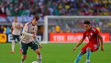  Jordi Cortizo (L) of Mexico fights for the ball with Sergio Gomez (R) of Colombia during the international friendly between Mexico (Mexican National team) and Colombia, at United Airlines Field at the Memorial Coliseum on December 16, 2023 in Los Angeles, California.