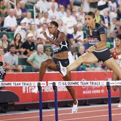 McLaughlin rompe la barrera de los 52'' y el rayo baja más a Bolt