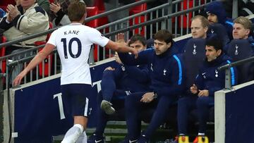 Harry Kane of Tottenham Hotspur and manager Mauricio Pochettino.