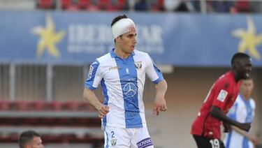 Bustinza breaks his nose, forces it back in to place on the pitch