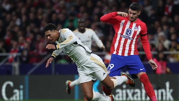 Real Madrid's English midfielder #5 Jude Bellingham falls down next to Atletico Madrid's Spanish forward #19 Alvaro Morata during the Spanish Copa del Rey (King's Cup) football match between Club Atletico de Madrid and Real Madrid CF at the Metropolitano stadium in Madrid on January 18, 2024. (Photo by Pierre-Philippe MARCOU / AFP)