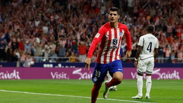 Atletico Madrid's Spanish forward #19 Alvaro Morata scores the opening goal during the Spanish Liga football match between Club Atletico de Madrid and Real Madrid CF at the Metropolitano stadium in Madrid on September 24, 2023. (Photo by Oscar DEL POZO / AFP)