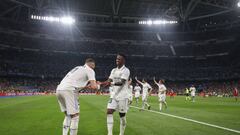 MADRID, SPAIN - MARCH 15: Karim Benzema of Real Madrid celebrates with Vinicius Junior after scoring the only goal of the game during the UEFA Champions League round of 16 leg two match between Real Madrid and Liverpool FC at Estadio Santiago Bernabeu on March 15, 2023 in Madrid, Spain. (Photo by Charlotte Wilson/Offside/Offside via Getty Images)