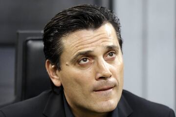 AC Milan coach Vincenzo Montella watches his players prior to a Serie A soccer match between AC Milan and Juventus, at the Milan San Siro stadium, Italy, Saturday, Oct. 28, 2017.
