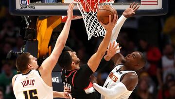 DENVER, COLORADO - MAY 07: Enes Kanter #00 of the Portland Trail Blazers takes the ball to the basket against Nikola Jokic #15 and Paul Millsap #4 of the Denver Nuggets in the first quarter during Game Five of the Western Conference Semi-Finals of the 2019 NBA Playoffs at the Pepsi Center on May 7, 2019 in Denver, Colorado. NOTE TO USER: User expressly acknowledges and agrees that, by downloading and or using this photograph, User is consenting to the terms and conditions of the Getty Images License Agreement.  Matthew Stockman/Getty Images/AFP
 == FOR NEWSPAPERS, INTERNET, TELCOS &amp; TELEVISION USE ONLY ==