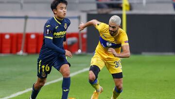 Villareal&#039;s midfielder Takefusa Kubo (L) vies for the ball with Maccabi&#039;s defender Maor Kandil during the UEFA Europa League group I football match between Maccabi Tel Aviv and Villarreal CF at the Bloomfield stadium in the Israeli city of Tel A