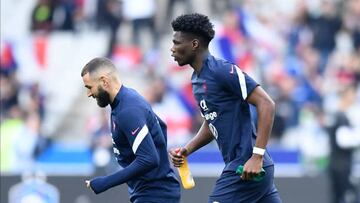 Karim Benzema (Real Madrid) of France and Aurelien Tchouameni (AS Monaco) of France during the warm-up before the UEFA Nations League League A Group 1 match between France and Denmark at Stade de France on June 3, 2022 in Paris, France. (Photo by Jose Breton/Pics Action/NurPhoto via Getty Images)