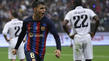 Barcelona's Spanish midfielder Pedri celebrates after scoring his team's third goal during the Spanish Super Cup final football match between Real Madrid CF and FC Barcelona at the King Fahd International Stadium in Riyadh, Saudi Arabia, on January 15, 2023. (Photo by Giuseppe CACACE / AFP)