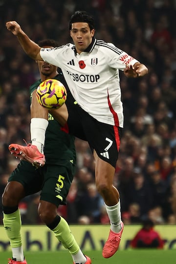 Fulham's Mexican striker #07 Raul Jimenez controls the ball during the English Premier League football match between Fulham and Brentford at Craven Cottage in London on November 4, 2024. (Photo by HENRY NICHOLLS / AFP) / RESTRICTED TO EDITORIAL USE. No use with unauthorized audio, video, data, fixture lists, club/league logos or 'live' services. Online in-match use limited to 120 images. An additional 40 images may be used in extra time. No video emulation. Social media in-match use limited to 120 images. An additional 40 images may be used in extra time. No use in betting publications, games or single club/league/player publications. / 