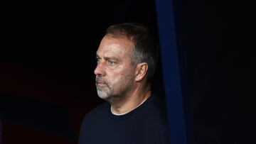 Barcelona's German coach Hans-Dieter Flick looks onb during the UEFA Champions League league phase match-day 3 football match between FC Barcelona and Olympiakos FC at Estadi Olimpic Lluis Companys in Barcelona on October 21, 2025. (Photo by Josep LAGO / AFP)