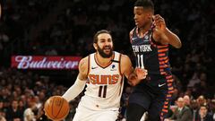 Jan 16, 2020; New York, New York, USA; Phoenix Suns guard Ricky Rubio (11) dribbles the ball while being defended by New York Knicks guard Frank Ntilikina (11) during the second half at Madison Square Garden. Mandatory Credit: Andy Marlin-USA TODAY Sports