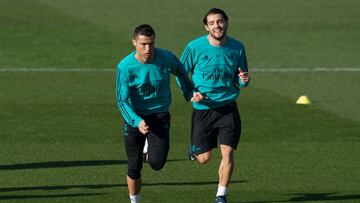 MADRID, SPAIN - DECEMBER 22: Cristiano Ronaldo of Real Madrid warms up with teammate Mateo Kovacic during the Real Madrid training session at Valdebebas training ground on December 22, 2017 in Madrid, Spain. (Photo by Denis Doyle/Getty Images)