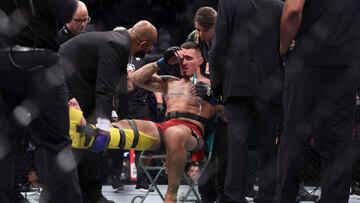 LONDON, ENGLAND - JULY 23: Tom Aspinall of England gets injured in the first round of his Heavyweight bout against Curtis Blaydes of USA during UFC Fight Night at O2 Arena on July 23, 2022 in London, England. (Photo by Julian Finney/Getty Images)