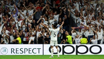 Real Madrid's English midfielder #5 Jude Bellingham celebrates scoring the opening goal during the UEFA Champions League 1st round day 1 group C football match between Real Madrid and Union Berlin at the Santiago Bernabeu stadium in Madrid on September 20, 2023. (Photo by OSCAR DEL POZO / AFP)