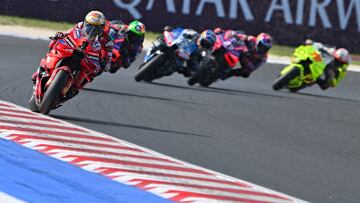 Ducati Lenovo Team's Italian rider Francesco Bagnaia (L) rides during the qualifying session of the Emilia-Romagna MotoGP Grand Prix at the Misano World Circuit Marco-Simoncelli in Misano Adriatico, on September 21, 2024. (Photo by Andreas SOLARO / AFP)