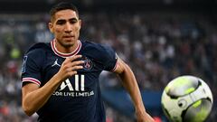 (FILES) In this file photo taken on May 21, 2022 Paris Saint-Germain's Moroccan defender Achraf Hakimi runs for the ball during the French L1 football match between Paris Saint-Germain (PSG) and Metz at the Parc des Princes stadium in Paris. - Paris Saint-Germain's Moroccan defender Achraf Hakimi is under investigation for rape. (Photo by Anne-Christine POUJOULAT / AFP)