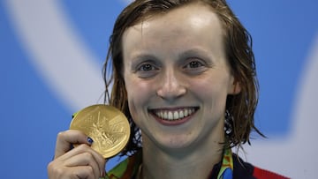 The seven-time Olympic champion made history in the 800m freestyle race at the US Swimming Team Trials in Indianapolis.