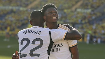 Real Madrid's French defender #18 Aurelien Tchouameni celebrates with Real Madrid's German defender #22 Antonio Rudiger after scoring his team's second goal during the Spanish league football match between UD Las Palmas and Real Madrid CF at the Gran Canaria stadium in Las Palmas de Gran Canaria on January 27, 2024. (Photo by DESIREE MARTIN / AFP)