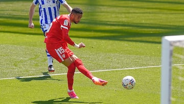 Sevilla's Moroccan forward Youssef En-Nesyri kicks the ball in an attempt to score during the Spanish League football match between Real Sociedad and Sevilla FC at the Anoeta stadium in San Sebastian on April 18, 2021. (Photo by ANDER GILLENEA / AFP)