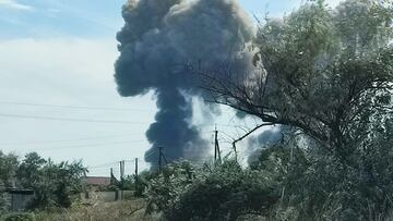 Smoke rises after explosions were heard from the direction of a Russian military airbase near Novofedorivka, Crimea August 9, 2022. REUTERS/Stringer