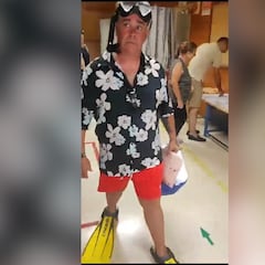 Watch: Man protests in Spain wearing snorkel and flippers to vote in general elections