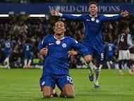 Chelsea's Brazilian striker #20 Joao Pedro (front) celebrates scoring the team's first goal with Chelsea's Argentinian midfielder #08 Enzo Fernandez (back R) during the English Premier League football match between Chelsea and Aston Villa at Stamford Bridge in London on December 27, 2025. (Photo by Glyn KIRK / AFP) / RESTRICTED TO EDITORIAL USE. No use with unauthorized audio, video, data, fixture lists, club/league logos or 'live' services. Online in-match use limited to 120 images. An additional 40 images may be used in extra time. No video emulation. Social media in-match use limited to 120 images. An additional 40 images may be used in extra time. No use in betting publications, games or single club/league/player publications. /